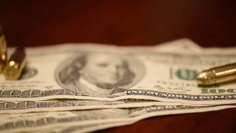 Pan dice bullets hundred dollar bills poker chips Stock Footage 75763626