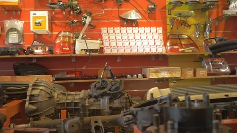 Pan display Different kinds of car spare part in automotive shop Stock Footage 97243082