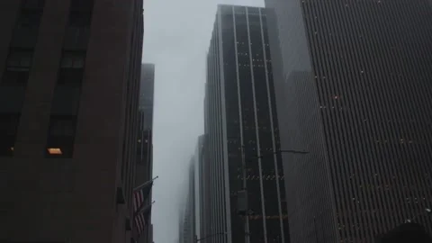 Pan Down Architecture from Clouds Stock Footage 130484704