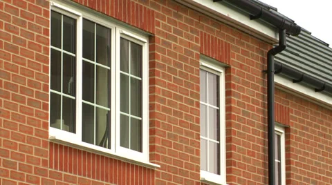 Pan down from bedroom window to front door Stock Footage 35596908