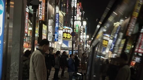 Pan Down to Capture Reflection of Tokyo at Night Reflected on Car Door - Tokyo, Vidéo 109199641