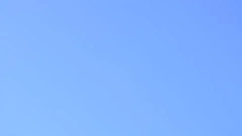 A pan down from a clear blue sky to Nelson statue in Trafalgar Square Stock Footage 142745854