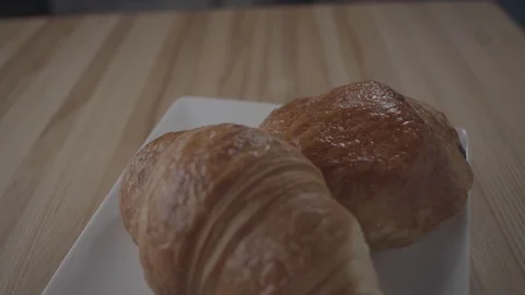Pan down of croissants Stock Footage 112821507