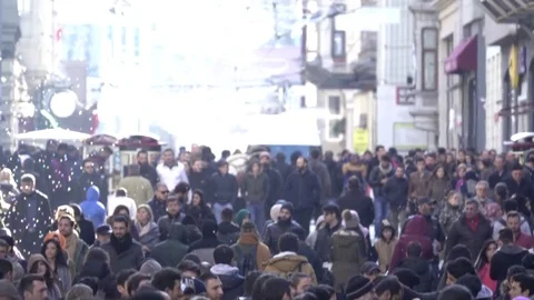 Pan Down to Crowd of People in City Stock Footage 80200378