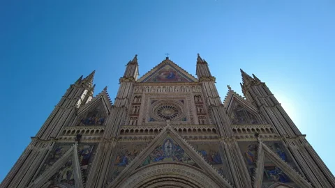 Pan down the facade of Orvieto cathedral in Umbria Stock Footage 158533834