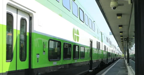 Pan down of GoTrain leaving station in Ontario,Canada, editorial exclusive 4K Stock Footage 170620021
