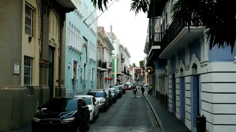Pan down to hispanic colonial street in Old San Juan Stock Footage 95950608