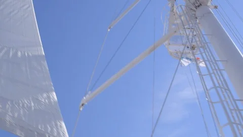 Pan down from mast onto a Windstar crouis ship in the aegean sea Stock Footage 108507360