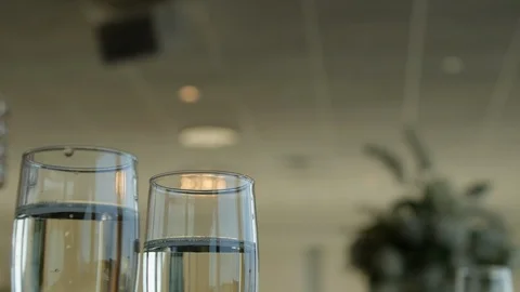 Pan down over two champagne  glasses Video stock 107948980