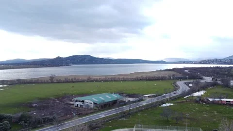 Pan down to parking lot and lake. Stock Footage 158547533