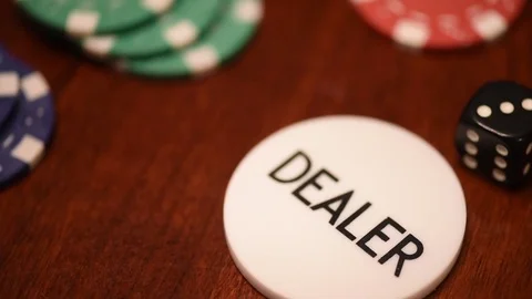 Pan down past poker chips to deal chip and dice Stock Footage 75763656