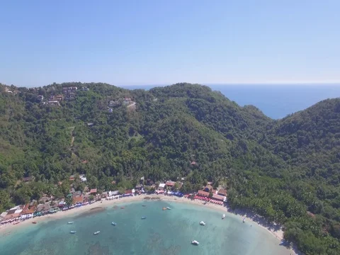 Pan Down Playa Las Gatas Beach / Pacific Ocean Stock Footage 77629757