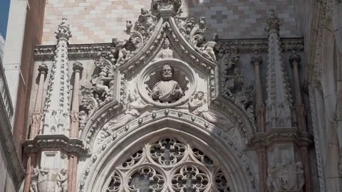 Pan down to reveal The Doge Francesco Foscari kneeling before the St. Mark's  Stock Footage 83283238