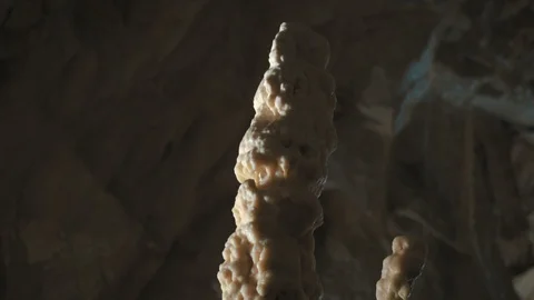 Pan down of a rock salt formation inside a cave. Stock Footage 94957377
