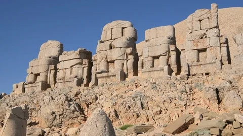 Pan down Royal Tomb of King Antiochus I,  East Terrace, Mount Nemrut , Turkey Stock Footage 104574432