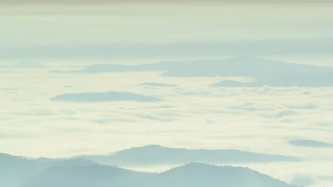 Pan down shot of Blue Ridge Mountains and fog at sunrise from Black Balsam Knob. Stock Footage 103826046