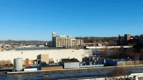 Pan down shot of industrial area in city Stock-Footage 100416571