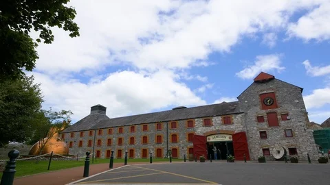 Pan down shot of Jameson Distillery in Ireland Stock Footage 93704744
