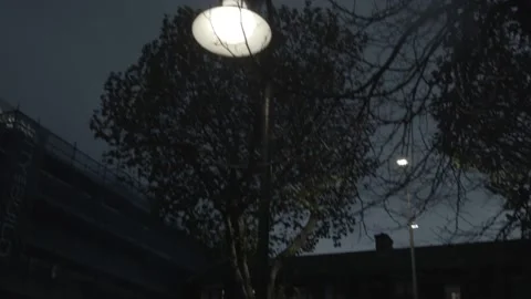 Pan Down Shot From Light To House 動画素材 143557171