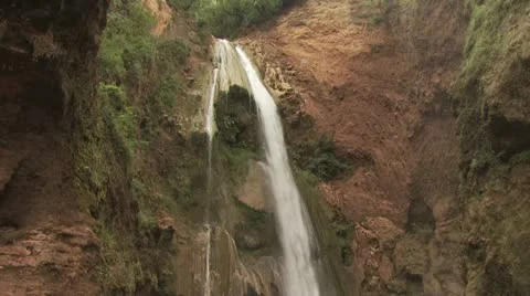 Pan Down View of a Powerful Tropical Waterfall Video stock 19228030