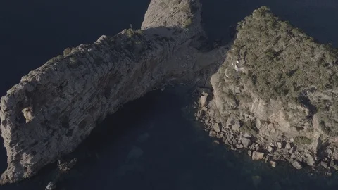 Pan drone footage of high cliff, bay and Balearic sea, Mallorca, Raw in 4K. Stock Footage 89893889
