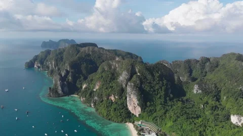 PAN DRONE Shot of phi phi island THAILAND, mountains and ocean views Stock Footage 237803550