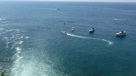 Pan From Duden Waterfall Edge Toward Boats on Mediterranean Sea Stock Footage 344038150