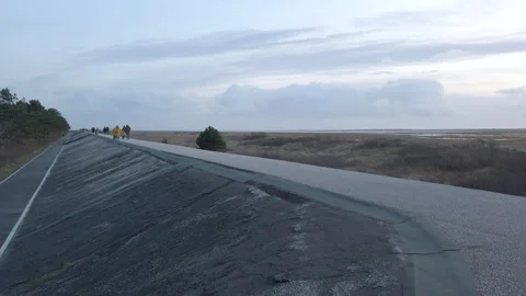 Pan from dyke at Sant-Peter-Ording to North Sea, 4k footage 스톡 동영상 262561533