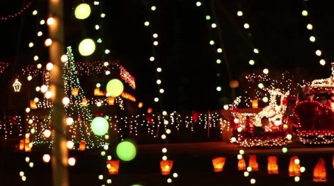 A pan of an elaborate Christmas light display Stock Footage 57301018