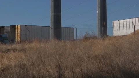 Pan Up Electrical Power Polls with Blue Sky Environment Industrial Stock Footage 97491157