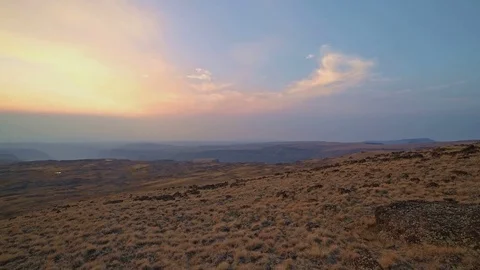 Pan of empty landscape at sunset from summit of Steens Mountain in fall 1 Stock Footage 81841066