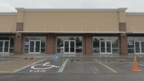 Pan of Empty retail outlets for lease Stock Footage 147203944