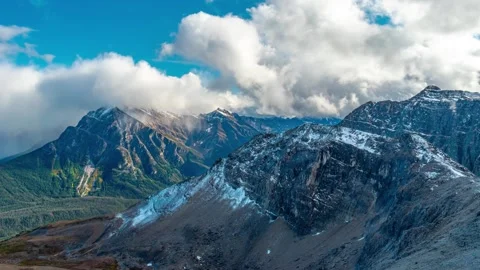PAN IN Epic Alaskan Mountain Summit With Snow Covered Peak Time Lapse 4k Stock Footage 134664137
