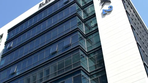 Pan On The Facade Of A Modern Office Building In A Business Center Stock Footage 72565936