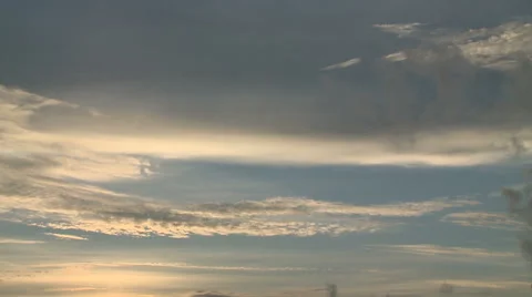 Pan of Feathery Clouds in Sky at Sunset Stock Footage 54713475