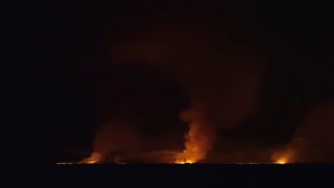 Pan Of Field Is On Fire At Night Stock Footage 78221244