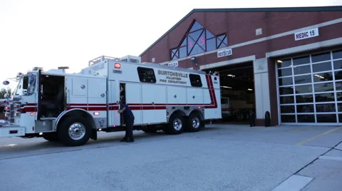 Pan to fire engine at the fire department Stock Footage 66548804
