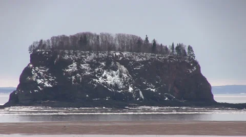 Pan of Five Islands, Nova Scotia at Low Tide in Winter Stock Footage 37033006