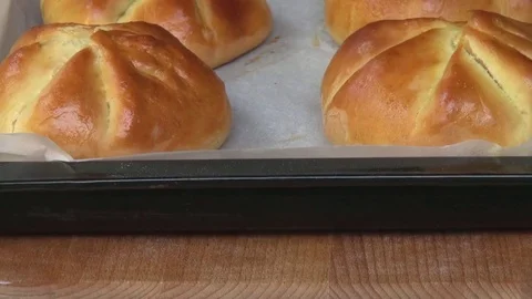 Pan of fresh appetizing pastries in a tray at a bakery Stock Footage 82311170