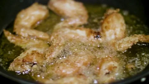 Pan with Fried Bacon. Fry the bacon in a hot pan. Closeup shot in the kitchen. 스톡 동영상 334642492