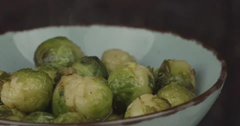 Pan fried brussels sprouts closeup Stock Footage 159358760