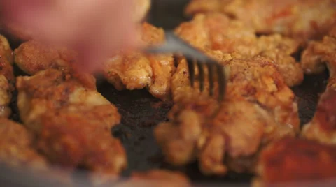Pan Fried Chicken Flipping Stock Footage 33360585
