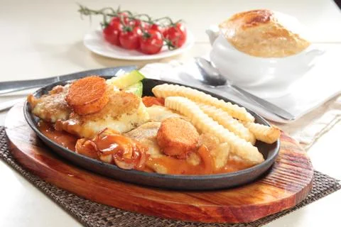 Pan fried chicken Stock Photos