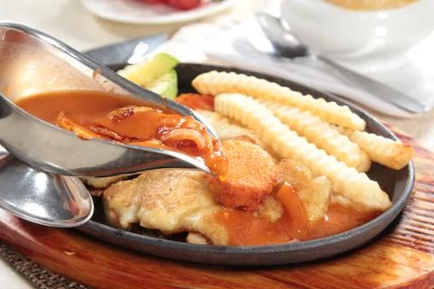 Pan fried chicken Stock Photos