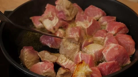 Pan fried cow meat close-up  Stock Footage 172257880