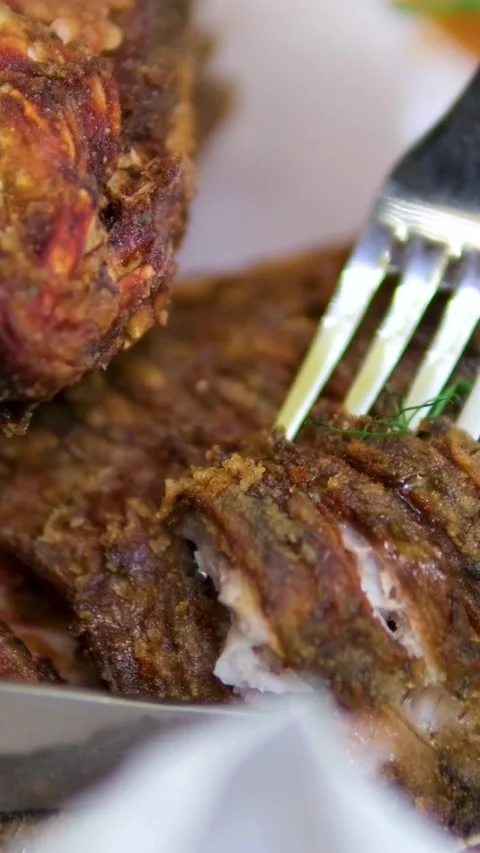 Pan-fried fish.The video shows the process of cooking fried fish in a skillet Stock Footage 323530313