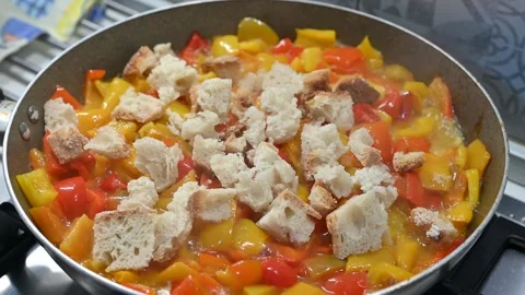 Pan-fried peppers with stale bread (1) Stock Footage 292275399