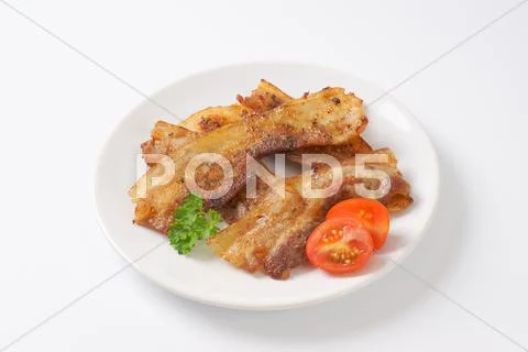 Pan fried side pork bacon Stock Photos