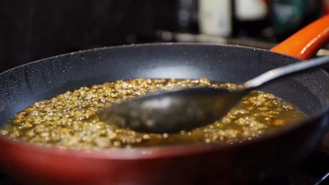 Pan fried Slow Motion 3 Stock Footage 126309184