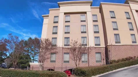 Pan front Hampton Inn and suites hotel Belair road Stock Footage 181810053